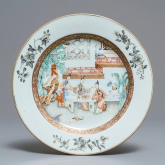 A fine Chinese famille rose plate with ladies in a garden, Yongzheng