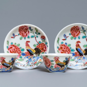 A pair of Chinese famille rose 'roosters' cups and saucers, Yongzheng/Qianlong