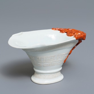 A Chinese 'bianco sopra bianco' and iron red libation cup, 19th C.