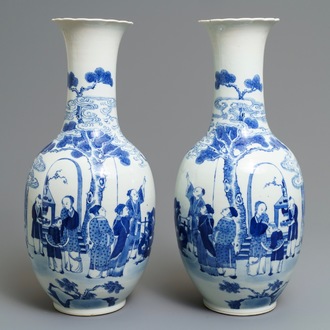 A pair of Chinese blue and white bottle vases, Kangxi mark, 19th C.