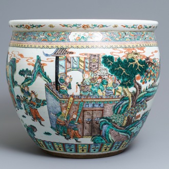 A large Chinese famille verte fish bowl with a narrative scene all-round, 19th C.