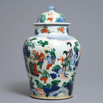 A Chinese wucai baluster vase and cover with playing boys, Transitional period