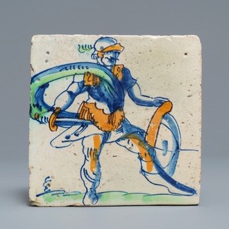 A polychrome Dutch Delft tile with a Roman soldier, Rotterdam, 1st quarter 17th C.