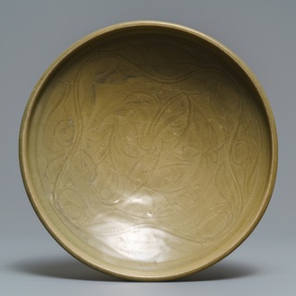 A Chinese Yaozhou celadon bowl with incised floral design, Song