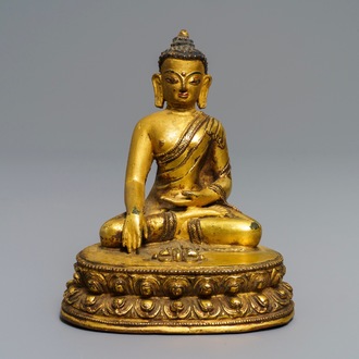 A gilt bronze figure of Buddha Vajrasana, Tibet, 15/16th C.