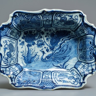 A rectangular Dutch Delft blue and white salad bowl with a peacock, 18th C.