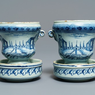 A pair of small Dutch Delft blue and white 'campana' vases on stands, 18th C.