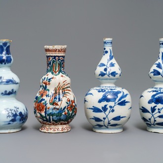 Four small Dutch Delft blue and white and cashmere palette vases, late 17th C.