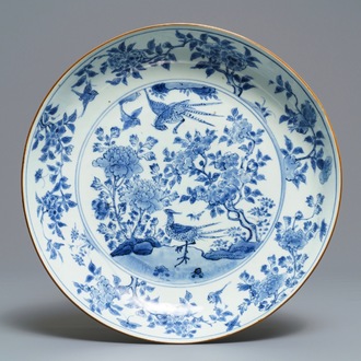 A Chinese blue and white dish with birds among blossoms, Transitional period