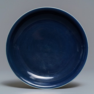 A Chinese monochrome sacrificial blue anhua 'dragon' dish, Wanli mark, 18/19th C.