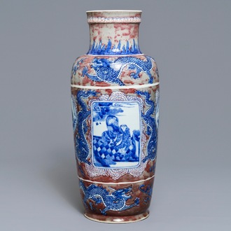 A rare Chinese blue, white and underglaze red rouleau vase, Kangxi