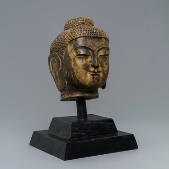 A Chinese carved stone head of Buddha Shakyamuni, Ming or later