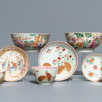 Two Chinese famille rose 'mandarin' bowls and three cups and saucers, Qianlong