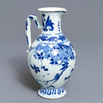 A Chinese blue and white jug with floral design, Transitional period