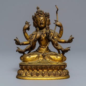 A Sino-Tibetan inlaid gilt bronze figure of Ushnishavijaya, 17/18th C.