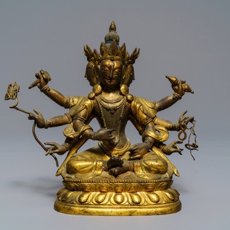 A Sino-Tibetan inlaid gilt bronze figure of Ushnishavijaya, 18th C.