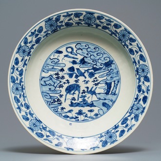 A fine and large Chinese blue and white inscribed Swatow dish, Ming