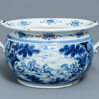 A large Dutch Delft blue and white 'deer hunting' jardiniere, 18th C.