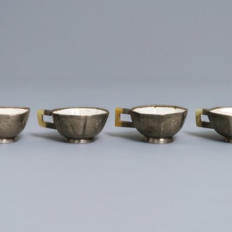 Four inscribed Chinese jade and pewter-mounted Yixing stoneware cups, 19/20th C.