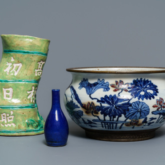 A Chinese blue, white and underglaze red censer, a wall pocket vase and a monochrome blue vase, 19/20th C.
