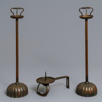 A pair of Japanese bronze shokudai candlesticks and a smaller example, Meiji/Showa, 19/20th C.
