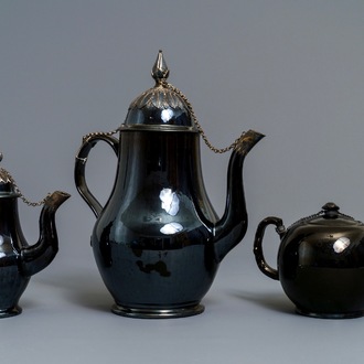 Two silver-mounted Namur black-glazed pottery jugs and a teapot, 18th C.