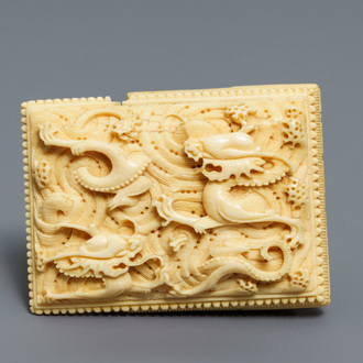 A Chinese ivory 'dragon' belt buckle, Wanli