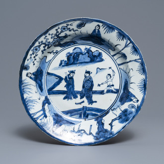 A Chinese blue and white kraak porcelain dish with figures in a landscape, Wanli