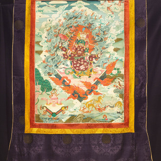 Un thangka à décor de Rahula dans son cadre, Tibet, 19ème