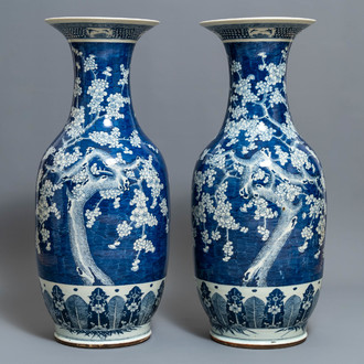 A pair of large Chinese blue and white 'prunus blossom' vases, 19th C.