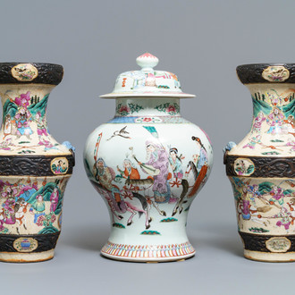 A pair of Chinese famille rose Nanking vases and a covered vase, 19th C.