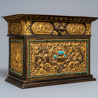 A turquoise-inlaid gilt bronze and copper repoussé 'tepchog' folding altar table, Tibet, 19th C.