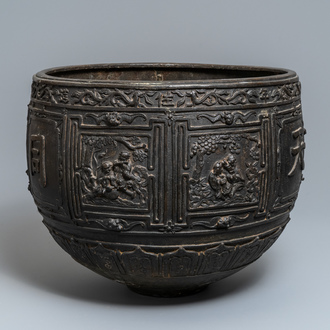 A large Chinese bronze relief-decorated jardinière, Xuande mark, 18/19th C.