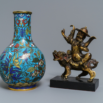 A Chinese cloisonné bottle vase and a gilt bronze group, 18/19th C.