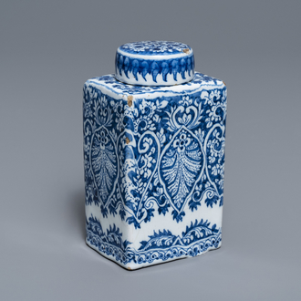 A Dutch Delft blue and white tea caddy with screw cap, late 17th C.