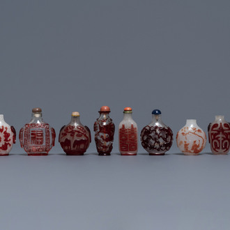 Ten Chinese red overlay, snowflake and transparent glass snuff bottles, 18/20th C.