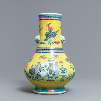 A Chinese yellow-ground famille rose bottle vase with antiquities design, Yongzheng