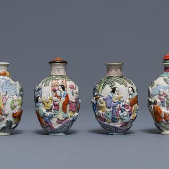 Four Chinese famille rose porcelain relief-decorated snuff bottles, 19th C.