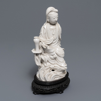 A Chinese Dehua blanc de Chine model of Guanyin, seal mark on the back, 19th C.