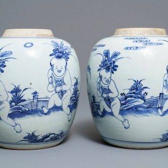 A pair of Chinese blue and white jars with boys in a garden, Kangxi