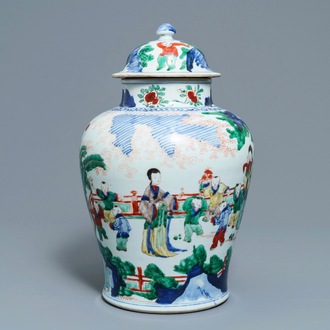 A Chinese wucai vase and cover with figures in a garden, seal mark, Transitional period