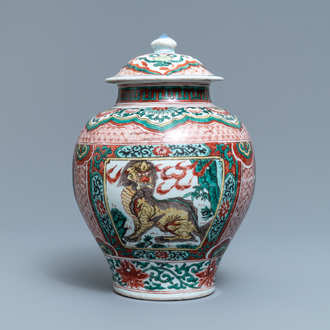 A Chinese wucai ‘mythical beasts’ vase and cover, Transitional period
