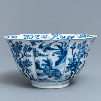 A Chinese blue and white bowl with mythical beasts and flowers, Kangxi