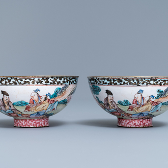 A pair of Chinese Canton enamel bowls with figures in a landscape, Yongzheng/Qianlong