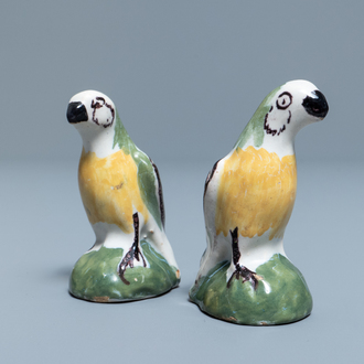 A pair of polychrome Dutch Delft miniature models of parrots, 18th C.