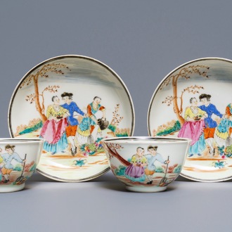 A pair of Chinese famille rose 'European subject' cups and saucers, Qianlong