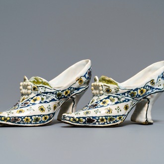 A pair of polychrome French faience lady's shoes, Lille, dated 1751