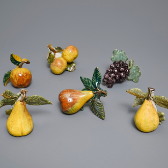 Six polychrome Dutch Delft models of apples, grapes and pears, 18th C.