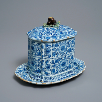 A rare Dutch Delft blue and white covered box with polychrome chestnut finial, 18th C.