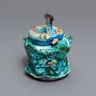 A Brussels faience eel tureen on stand with butterflies and caterpillars, late 18th C.